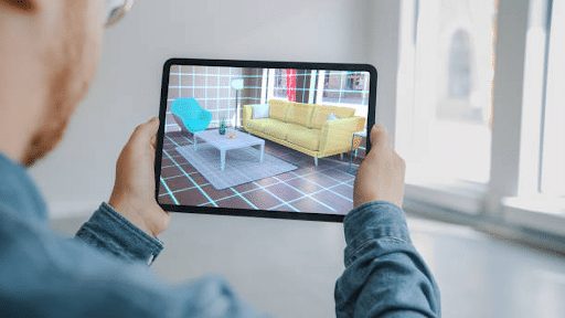 man using his tablet AR features for interior planning
