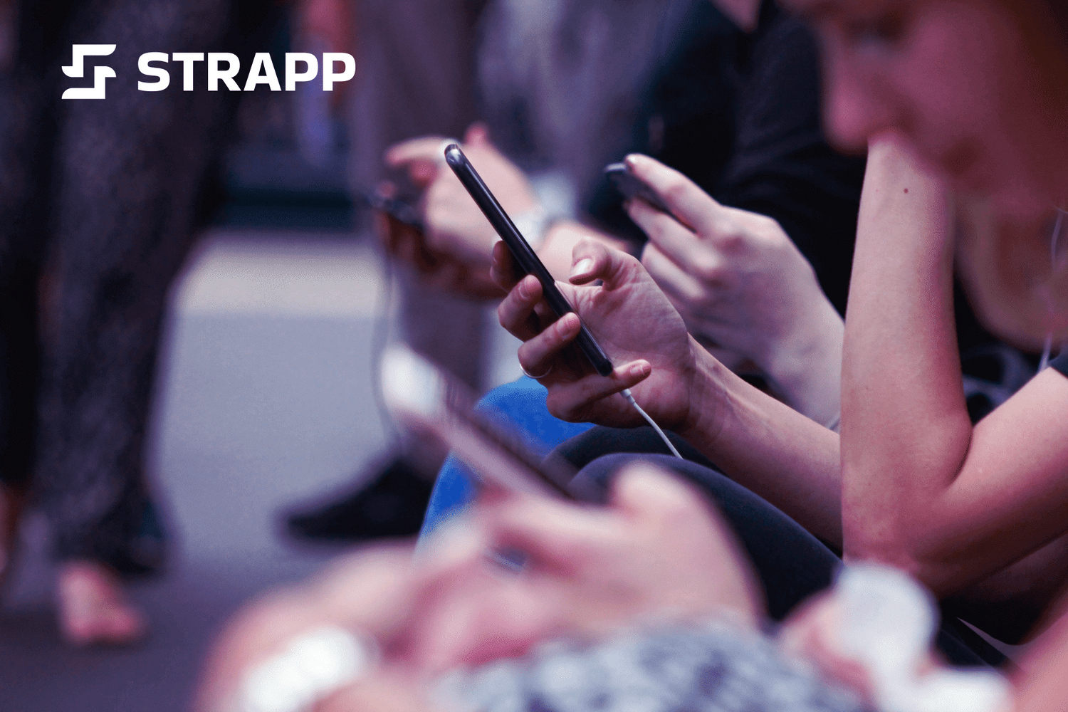 STRAPP Logo with people playing mobile games